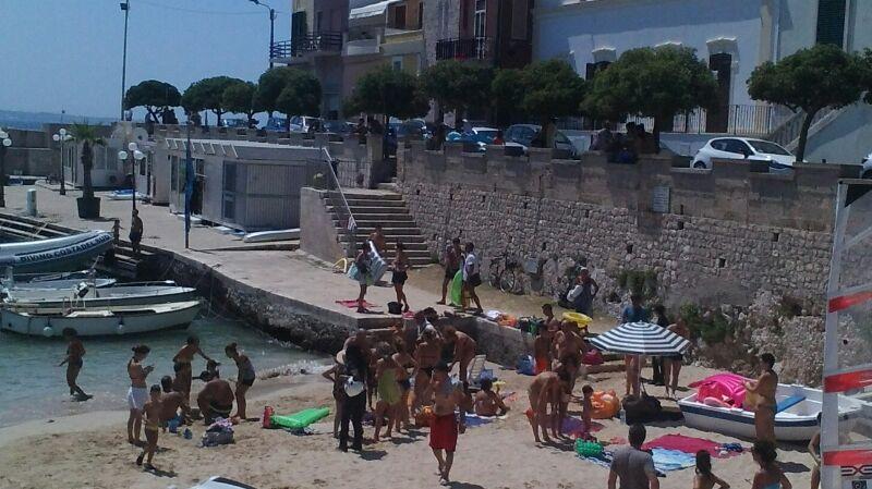 sogmbero bagnanti spiaggia santa caterina